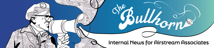 A long blue banner showing Wally Byam holding a bullhorn, with the text The Bullhorn displayed to the right. The bottom reads Internal news for Airstream Associates.